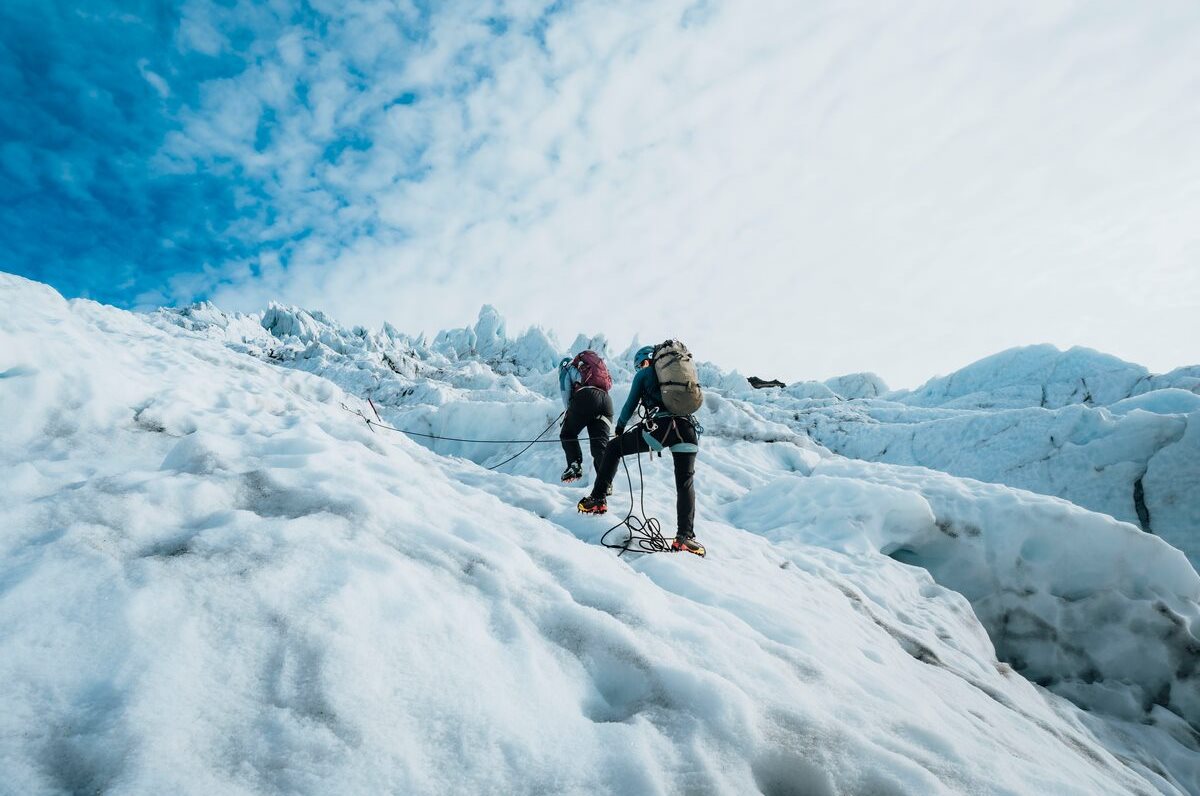 Go ice climbing with an expert glacier guide. Ice wall climbing at falljokull glacier tour group