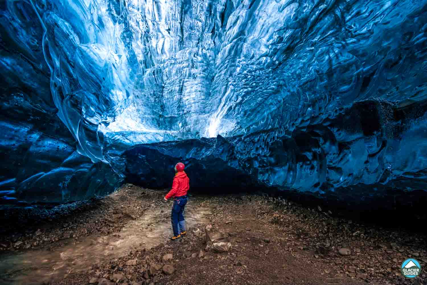 Man Inside A Glacier Ice Cave