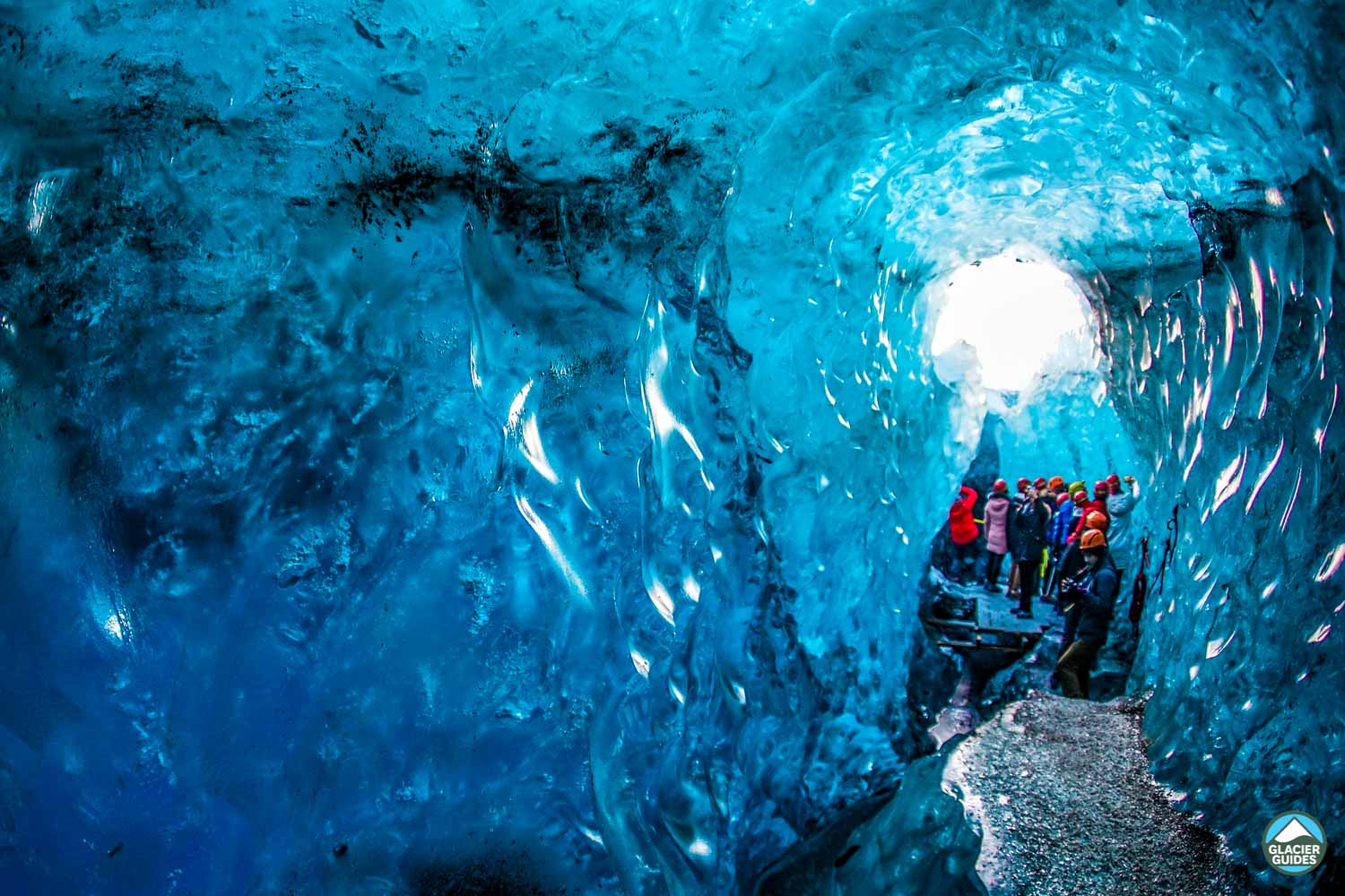 Group In Crystal Blue Ice Cave
