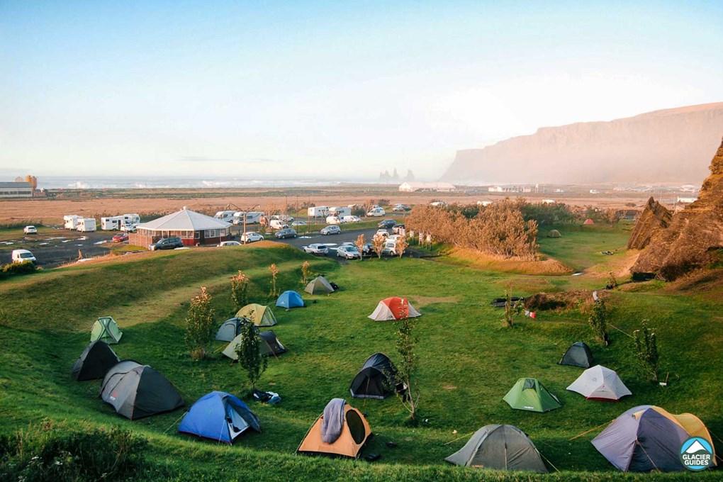 Camping ste with tents in Vik